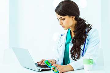 Woman using laptop computer